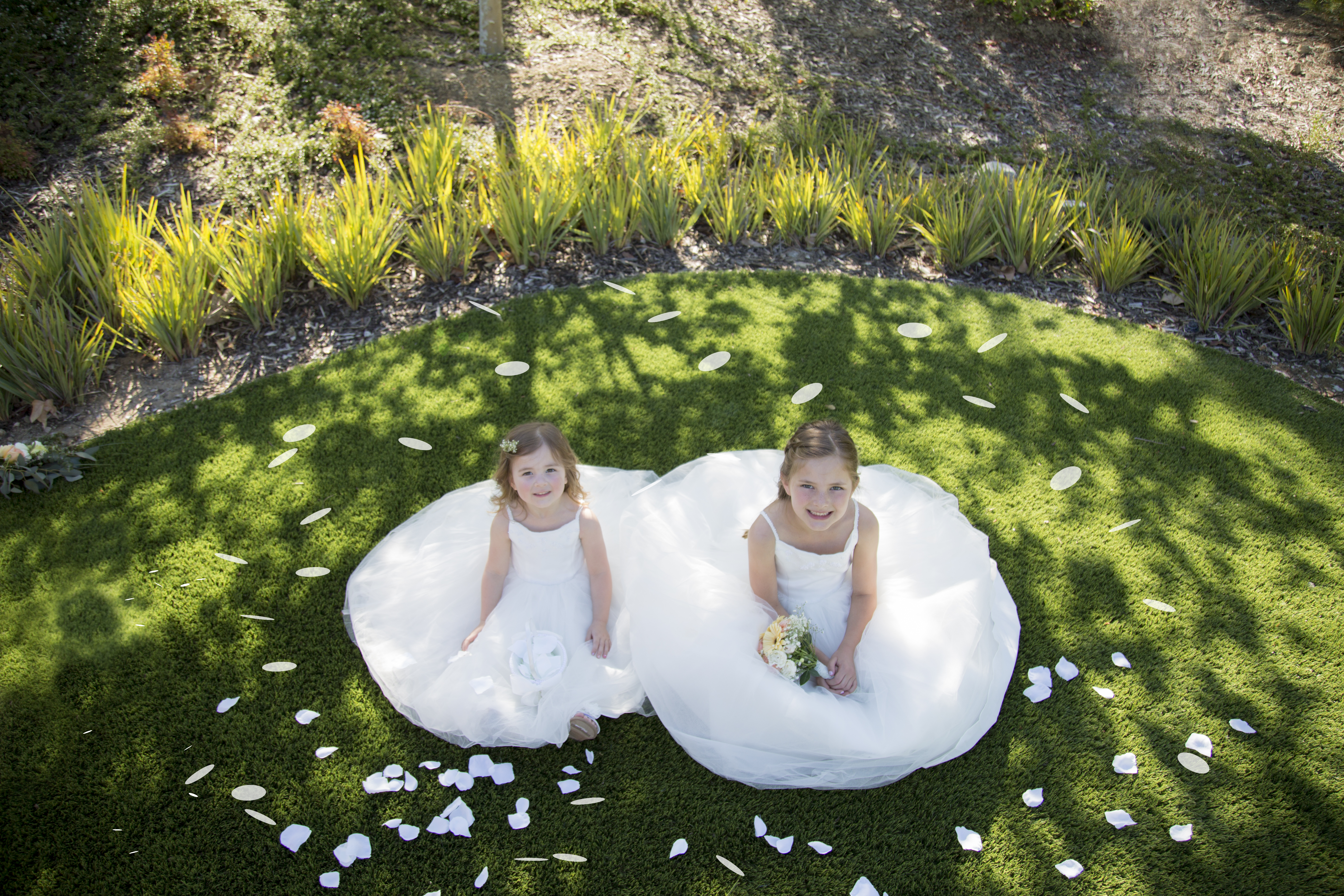 Outdoor portrait of two young sisters, an example of family photography in Utah.
